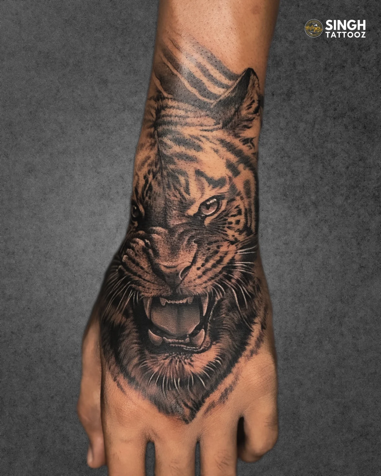 Tiger-animal-tattoo design on hand